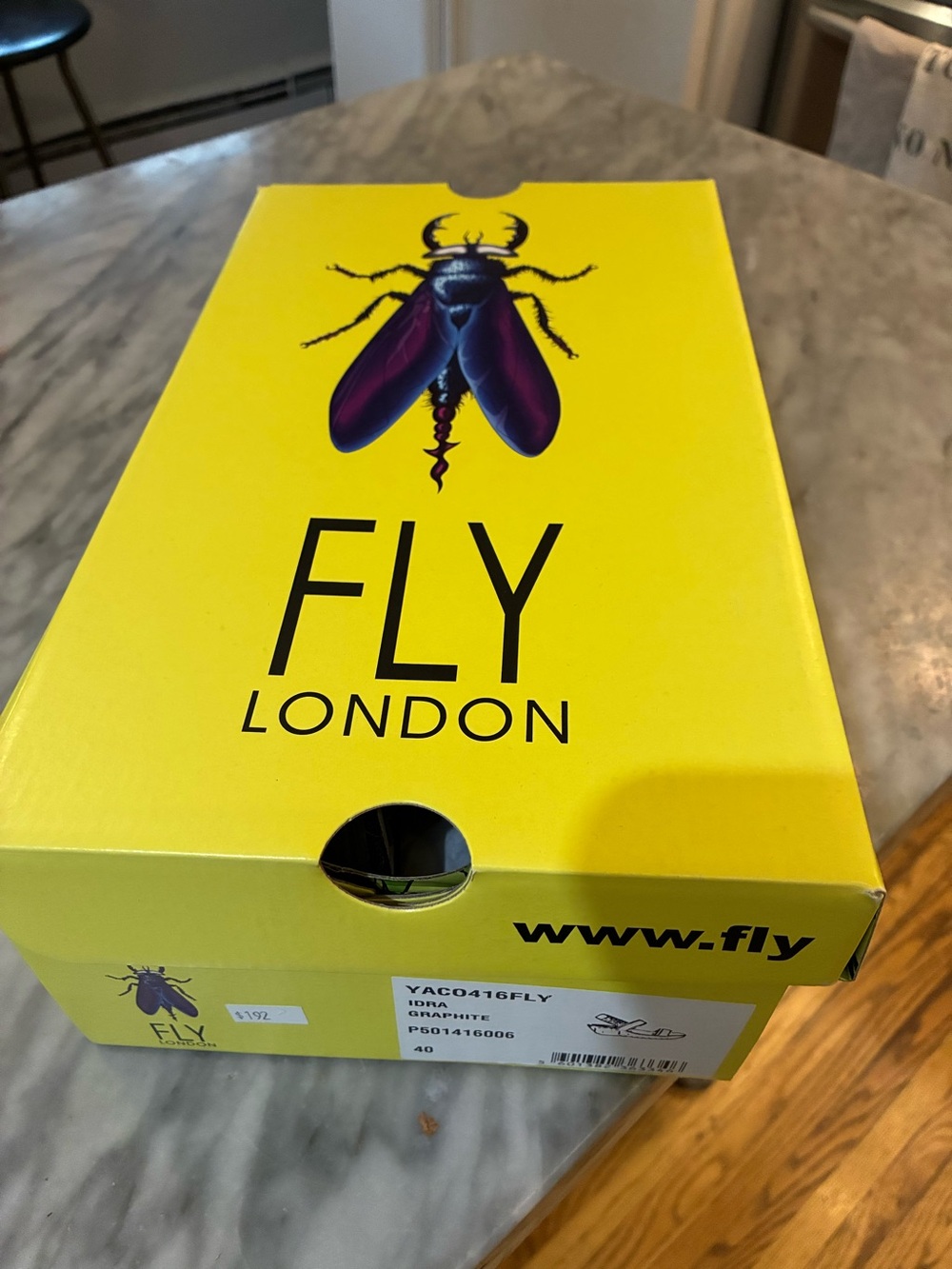 Fly London Yellow Shoe Box with Purple Fly Graphic